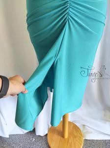 Abito Cosetta colore tiffany con manica drappeggiata